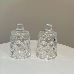 Elegant White Glass Candle Holders with Intricate Accents